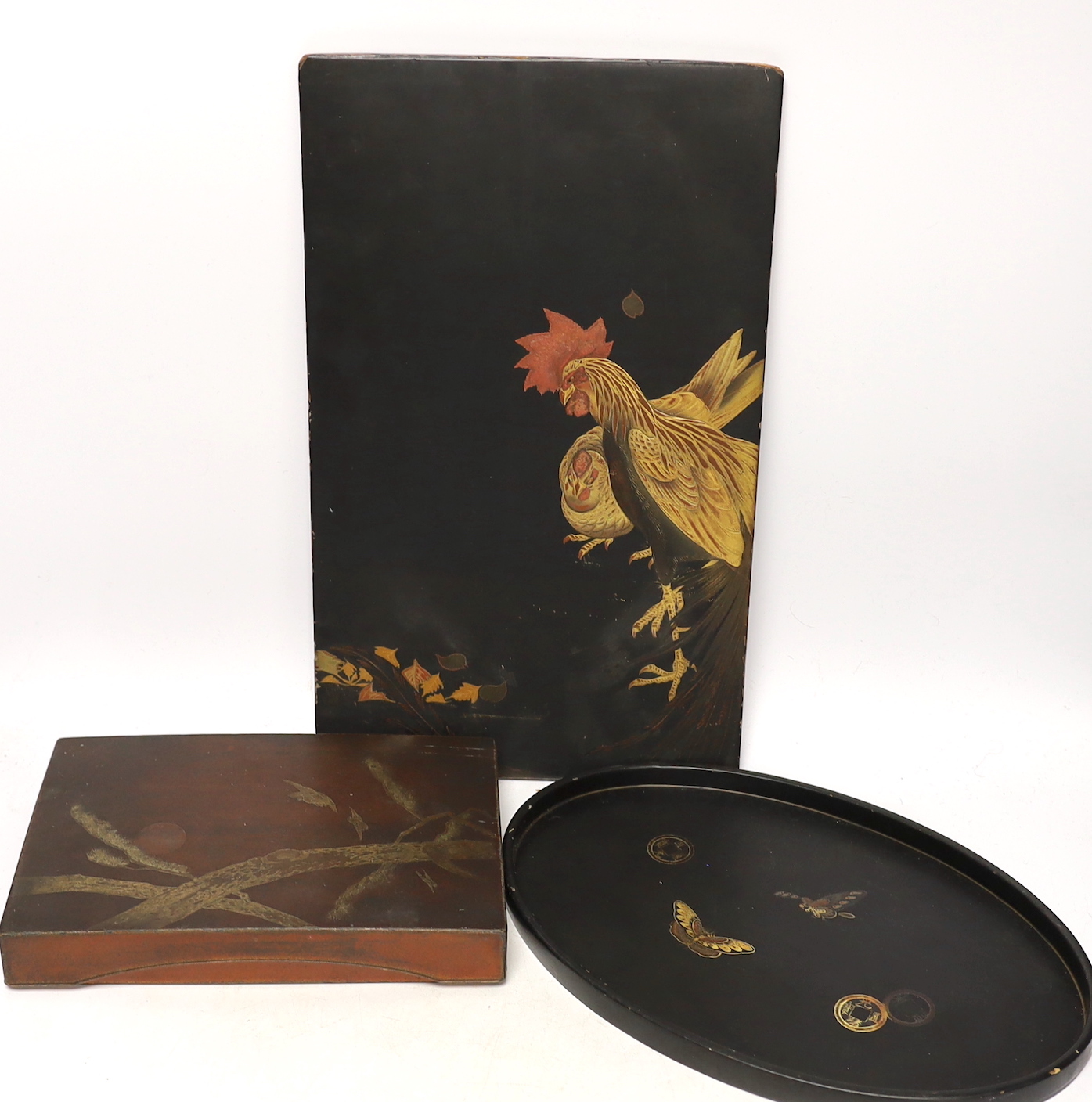 A Japanese lacquer box, small oval tray and a panel, 39.5 x 24.5cm